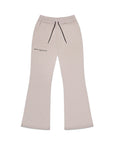 Flat lay of Brklyn Park Essence Fleece Sweatpants in neutral beige with black drawcord and flared leg