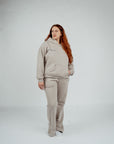 Brklyn Park women's fleece sweatpants in gray, paired with matching hoodie for minimalist loungewear look