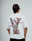 Model wearing the Brklyn Park Archangel Tee white oversized graphic t-shirt with angel artwork and red rose detailing, viewed from the back supreme streetwear